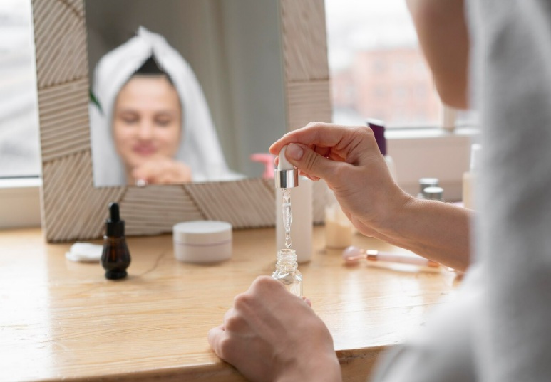 Applying facial serum at home